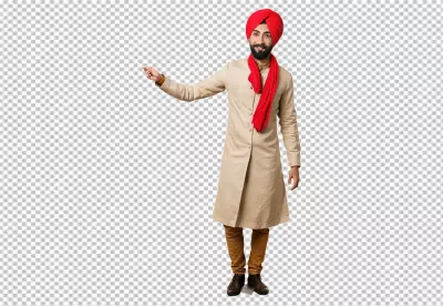 Smiling Young Punjabi Man in Traditional Turban and Kurta Gesturing Upwards image