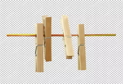 Colorful clothespins hanging on a string  wood color