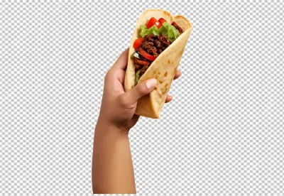 Hand Holding a Delicious Mexican Soft Taco Filled with Seasoned Meat and Fresh Vegetables image