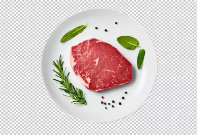 Delicious Raw Steak with Rosemary and Sage on White Plate Ready for Cooking image
