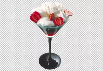 A glass of orange juice with cherries and mint in 