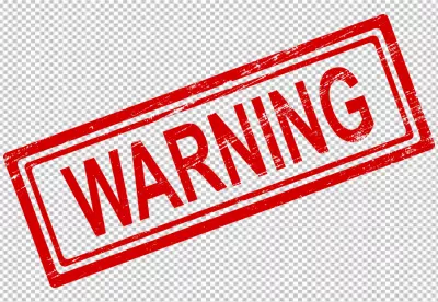 Red Warning Stamp on Black Background