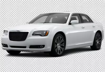 Closeup shot of a white retro car parked on a dry field under a cloudy sky