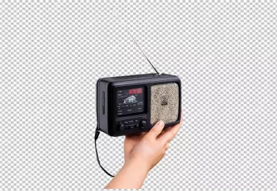 Hands Holding Classic Black Retro Portable Radio with Antenna image