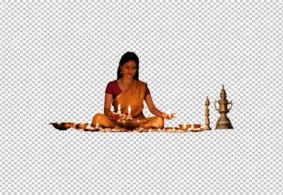 Indian Woman in Golden Saree Lighting Traditional Oil Lamps for Festival Celebration image