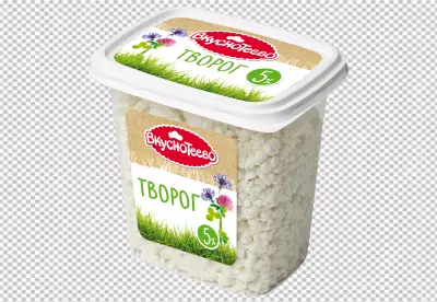 A bowl of sour cream cheese with mint leaves on it