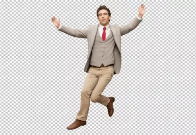 Energetic Young Man in Grey Suit and Red Tie Jumping Joyfully image