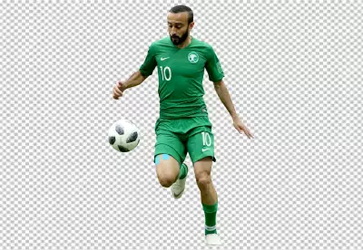 Mohammad Al-Sahlawi professional soccer player in a green uniform with the number 10 on his back