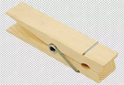 Rustic wooden clothespins on a sunlit laundry