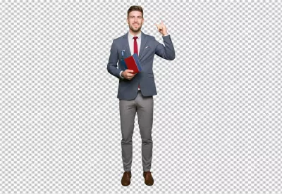 Smiling Young Professional Man in Suit Holding Books Pointing Up image