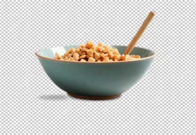 Finely Chopped Nuts in a Vibrant Teal Bowl with a Small Wooden Spoon image
