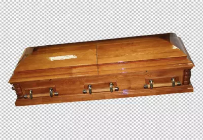 wooden coffin with a cross on the lid emphasizing simplicity and tradition