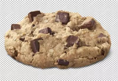 chocolate drops inside the prepared shortbread dough, homemade cookies of irregular round or oval shape