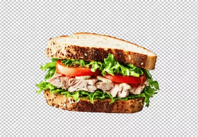 Delicious Whole Grain Tuna Sandwich with Fresh Lettuce and Sliced Tomatoes image