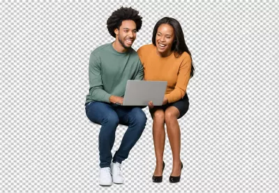 Happy young couple engaging with laptop enjoying online content together laughing image