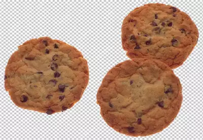 Pile of cookies with chocolate chips in front of cloth
