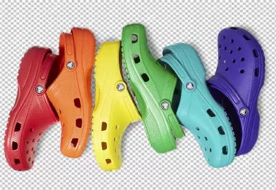 Rainbow Crocs on a white background Rubber shoes