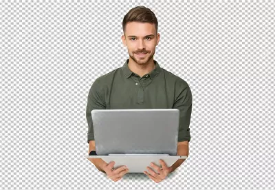 Smiling Young Man in Casual Attire Presenting Laptop Screen for Business or Study image