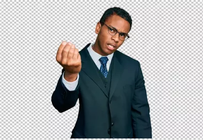 Young Professional Man Making Assertive Gesture with Questioning Expression image