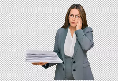 Young Businesswoman Overwhelmed by Massive Paperwork Feeling Stress and Pressure image