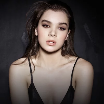 Intense Beauty Portrait of Young Woman with Glamorous Eyes and Dark Attire image