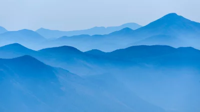 Misty Blue Mountain Layers with Hazy Atmospheric Perspective image