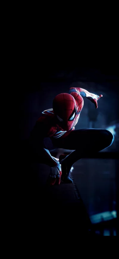Dynamic Spiderman Crouching and Reaching Out in Dark Urban Setting