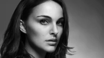 Stunning Monochrome Portrait of Natalie Portman with Intense Gaze and Elegant Hair image