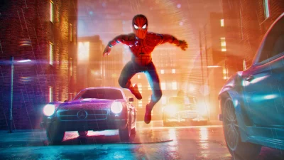 Dynamic Spider-Man Leaping Over Cars in a Rainy Neon City Street Wallpaper image