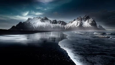 Dramatic Vestrahorn Mountain Reflection on Black Sand Beach at Stokksnes image