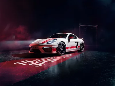 High-Performance White Porsche Sports Car with Red Accents in Dark Studio Environment image