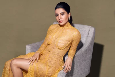 Samantha Ruth Prabhu Sitting Elegantly in Yellow Lace Dress on Chair Glamorous Cinematic Stock Photo image