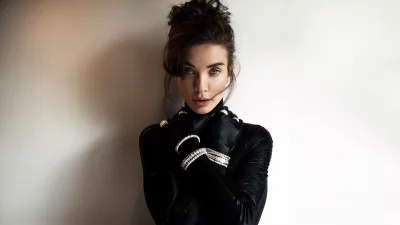 Elegant Woman in Black with Dazzling Diamond Bracelets and Gloves image