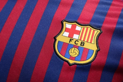 Official FC Barcelona Soccer Jersey Fabric with Vibrant Club Emblem image