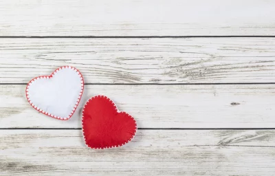 Handcrafted Felt Hearts on Rustic White Wood for Valentine's Day and Love Concepts image