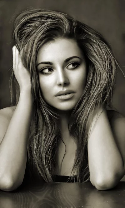 Beautiful Young Woman with Voluminous Hair and Thoughtful Gaze in Sepia Portrait image