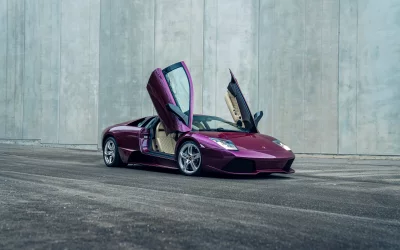 Luxurious Purple Lamborghini Murciélago Supercar with Iconic Scissor Doors Open image