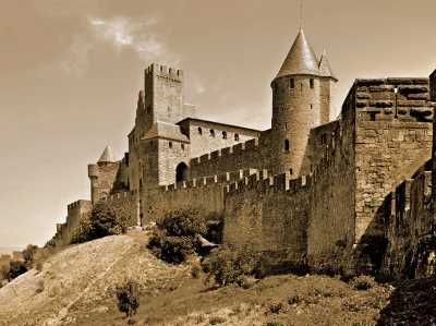 Majestic European Medieval Castle and Ancient Fortification in Sepia image