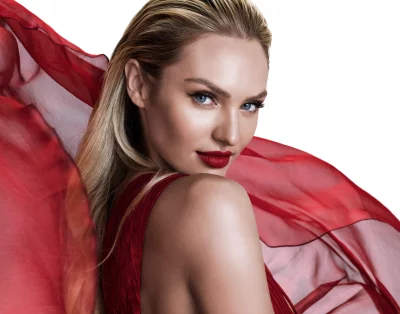 Candice Swanepoel's Mesmerizing Gaze in Dramatic Red Sheer Fabric image