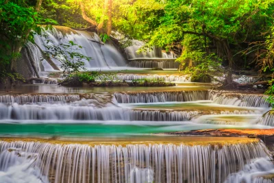 Huay Mae Khamin Waterfall, Lush Tropical Forest Cascades with Sunlit Pools image