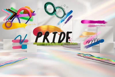 Vibrant artistic display of abstract shapes and 'PRIDE' text with rainbow reflections on white image
