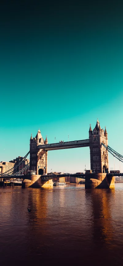 Golden Hour Reflection of Tower Bridge London Over River Thames