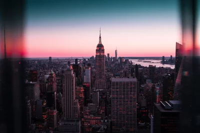 Cinematic New York City Skyline with Empire State Glowing at Sunset image