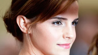 Elegant Young Woman's Serene Profile with Captivating Brown Eyes image