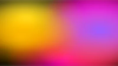 a beautiful abstract blur of yellow, pink, and purple