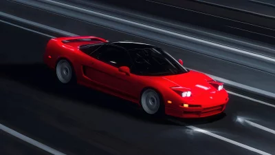 Sleek Red Sports Car with Pop-Up Headlights Speeding on Dark Road at Night image