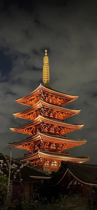 Stunning Five-Story Japanese Pagoda Illuminated at Night