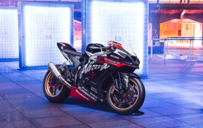 Sleek Kawasaki Ninja ZX-10R Sportbike Showcased Under Futuristic Blue Neon Lights image