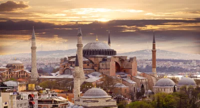 Historic Hagia Sophia Mosque at Golden Hour in Istanbul, Turkey, with City Panorama image
