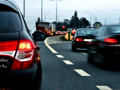 Urban Traffic Jam at Dusk with Vehicle Taillights and Motion Blur on a Busy Highway image